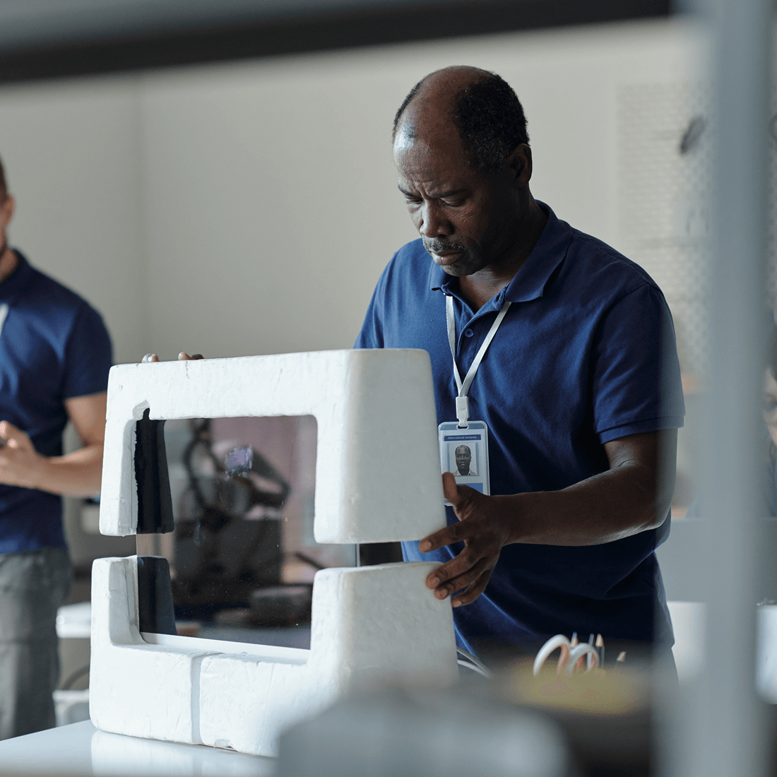 Man packing computer carefully